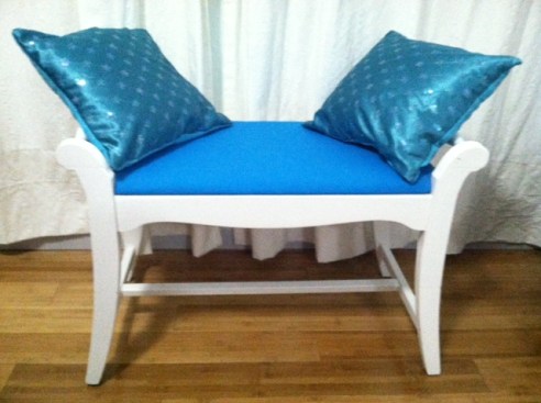 I added a bench seat (which I painted and reupholstered, then made pillows to match).