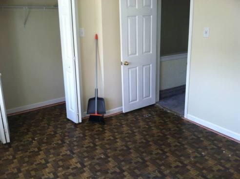 First, I tore out all of the carpet to reveal and okay-but-not-great parquet floor