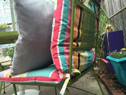 Here's the back of the cushion with the ties I added to keep it attached to the chair.