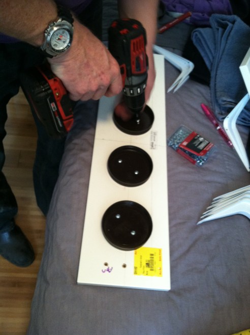 My dad helped me make a standing vanity out of recycled Talenti jars