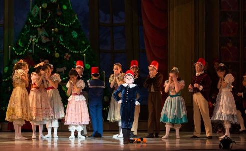 The School of Pennsylvania Ballet Student Rowan Duffy and Artists of Pennsylvania Ballet in George Balanchine’s The Nutcracker™ Photo: Alexander Iziliaev
